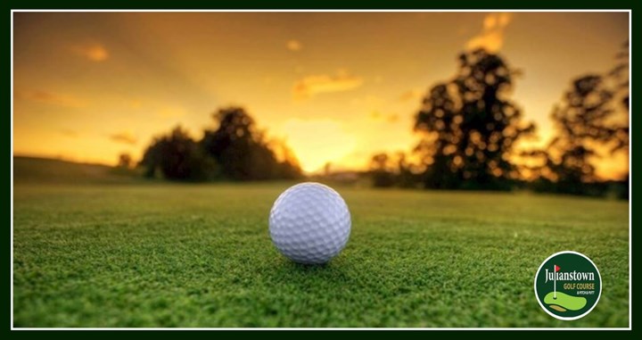 Golf ball on the Julianstown course at golden sunset
